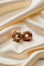Luxury Gold Interlinked Knot Stud Earrings - Image 3