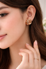Luxury Gold Interlinked Knot Stud Earrings - Image 2